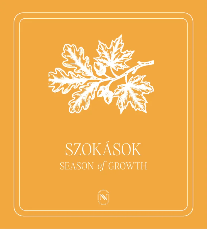 A Szokások pakli borítója: fehér tölgylevél és makk rajz narancssárga alapon, Season of Growth felirattal